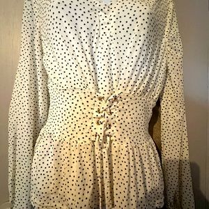 White shirt, black dots. Tie in the front, very slimming effect!